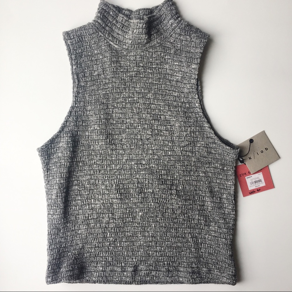 Sleeveless mock neck sweater crop top